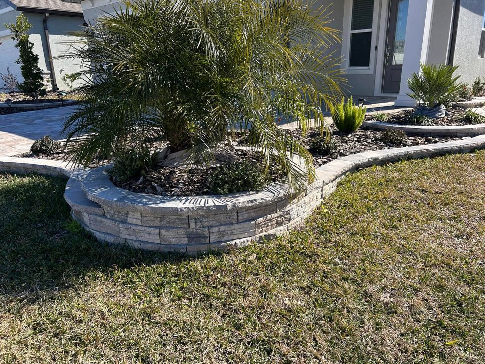 Our Fall Clean Up service prepares your yard for winter by removing leaves, debris, and trimming plants, ensuring a neat appearance while promoting healthy growth through the colder months. for J and E LAWN Landscaping in Gainesville, Florida