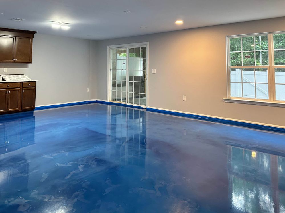 Our Painter Service company installs durable, attractive epoxy floor coatings that protect concrete, resist stains, and brighten garages, basements, and workspaces with a smooth, long-lasting finish homeowners trust. for Tracy Brothers Painting in St. Charles County, MO