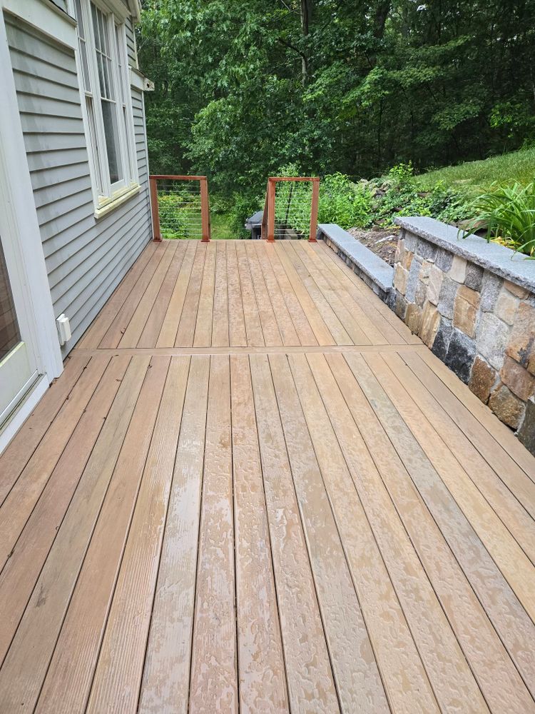Transform your outdoor space with our expert Deck & Patio Installation services. We design and build durable structures tailored to your style and needs for year-round enjoyment in a beautiful setting. for Eglin Construction in Georgetown, MA