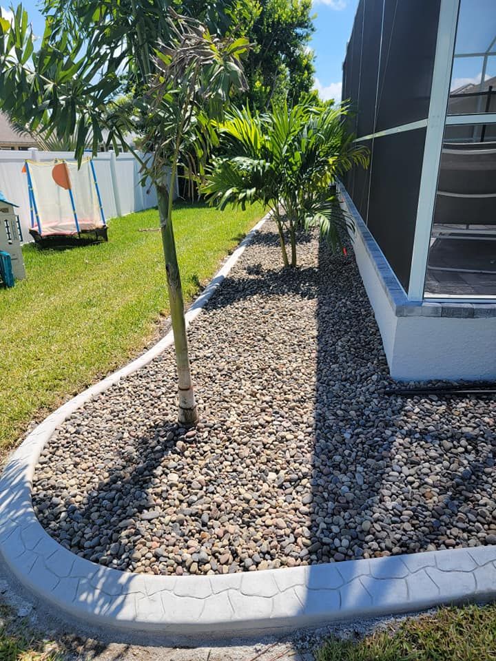 Our mulch and rock installation service provides homeowners with the opportunity to enhance their landscape by adding a protective layer of organic material, promoting healthy plant growth and reducing weed growth. for Advanced Landscaping Solutions LLC in Fort Myers, FL