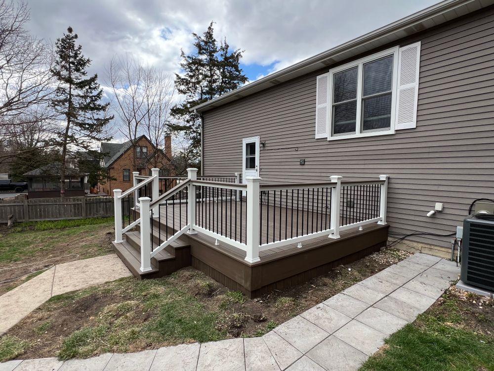Enhance your home's curb appeal with our expert porch services, offering custom design and quality craftsmanship to create beautiful, functional outdoor spaces that perfectly complement your home’s style and needs. for WoodCor Carpentry in Buffalo Grove, IL