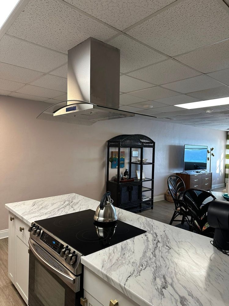 Transform your kitchen with our expert cabinet refinishing service. We rejuvenate and update the look of your space with precision craftsmanship and durable finishes tailored to match your style seamlessly. for Walls N All Painting, LLC in Panama City, FL