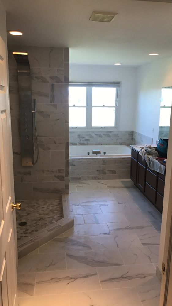 Transform your space with our professional bathroom renovation services, offering expert craftsmanship and personalized designs to elevate functionality and style in your home. experience enhanced comfort through our meticulous remodeling process. for Kingdom Carpentry in Jackson, MI