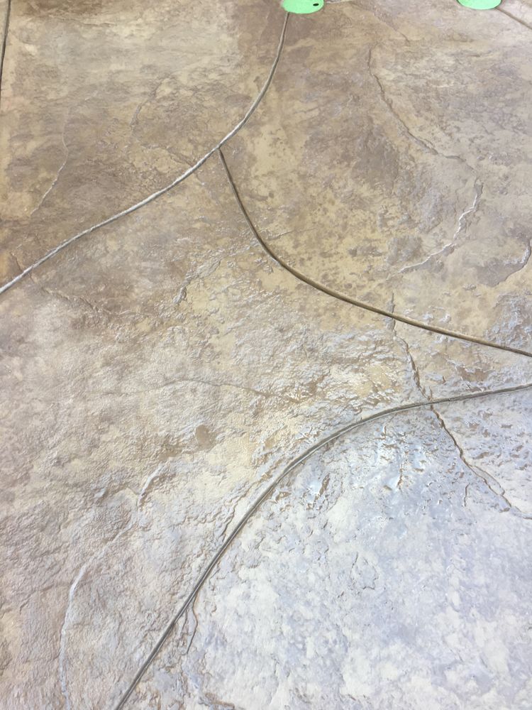 Our Stamped Concrete Installation service provides homeowners with the opportunity to enhance their outdoor spaces by creating visually appealing and durable concrete surfaces with different colors, patterns, and textures. for Freedom Contracting Of Texas LLC. in Springtown, TX