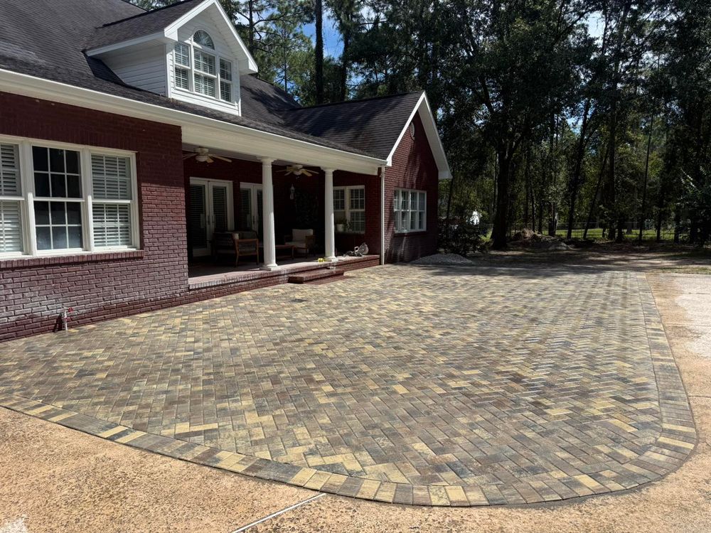 Transform your outdoor space with our expert Brick Pavers service. We design and install durable, visually appealing patios, walkways, and driveways that enhance curb appeal and ensure long-lasting satisfaction for homeowners. for Santos Landscape in Waycross, GA