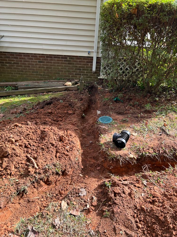 Our French Drains service helps keep your home dry by diverting surface water away from its foundation. Let us take care of it for you! for Cisco Kid Landscaping Inc. in Lincolnton, NC