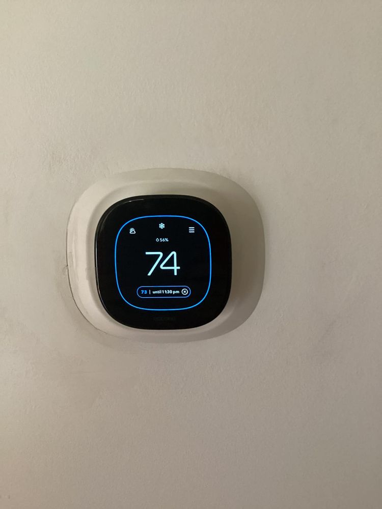 Our Thermostat Installation and Programming service ensures optimal comfort and energy efficiency, with expert technicians providing seamless installation and personalized programming tailored to your home's specific heating and cooling needs. for Comfort 101 in Clinton, NC