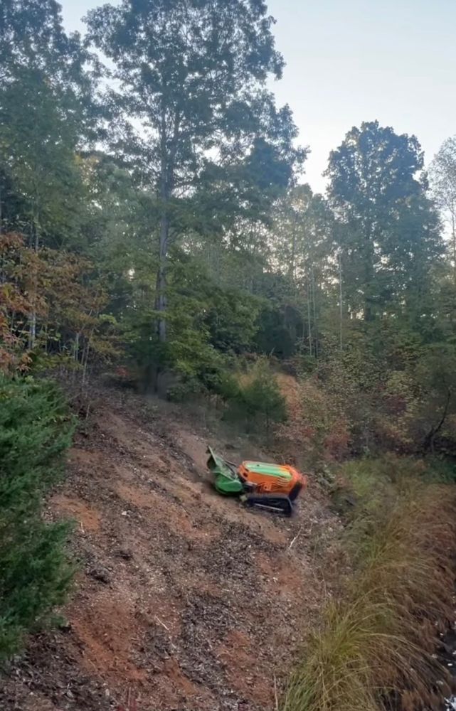 Our Steep Slope Mulching service efficiently stabilizes challenging landscapes, preventing erosion and enhancing soil health. Ideal for residential properties, it ensures effective vegetation management and maintains the beauty and safety of your terrain. for Mountain Goat Land Management in Galax, VA