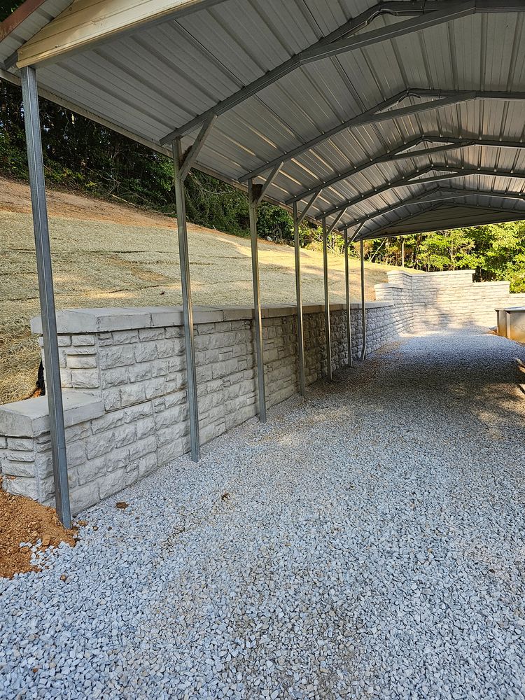 Our Retaining Walls service offers durable, expertly designed solutions to prevent soil erosion, enhance landscape aesthetics, and provide structural support for your property while ensuring seamless integration with the surrounding environment. for Walker Excavation in Tazewell, TN