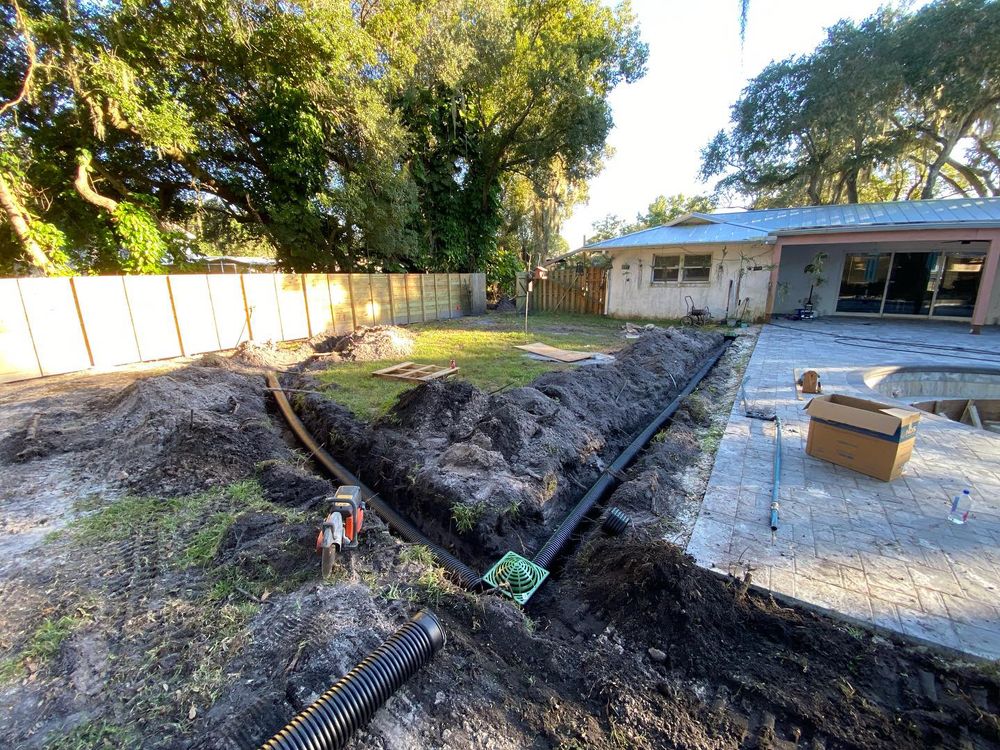 Our Yard drains and French drains service effectively manages water flow, preventing erosion and flooding in your yard. Ensure proper drainage to protect your property's foundation with our expert solutions. for C & S Grading in Saint Cloud, FL