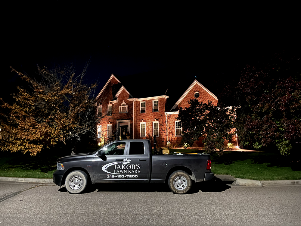 Enhance your outdoor living space with our expert landscape lighting low voltage service. Illuminate pathways and garden features while conserving energy for a captivating nighttime ambiance in your home's surroundings. for Jakob’s Lawn Kare in Wichita, KS