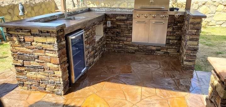 Our Custom Outdoor Kitchen service provides homeowners with a personalized and functional cooking space in their backyard, enhancing their outdoor living experience. for Oasis Landscaping LLC  in El Paso, TX