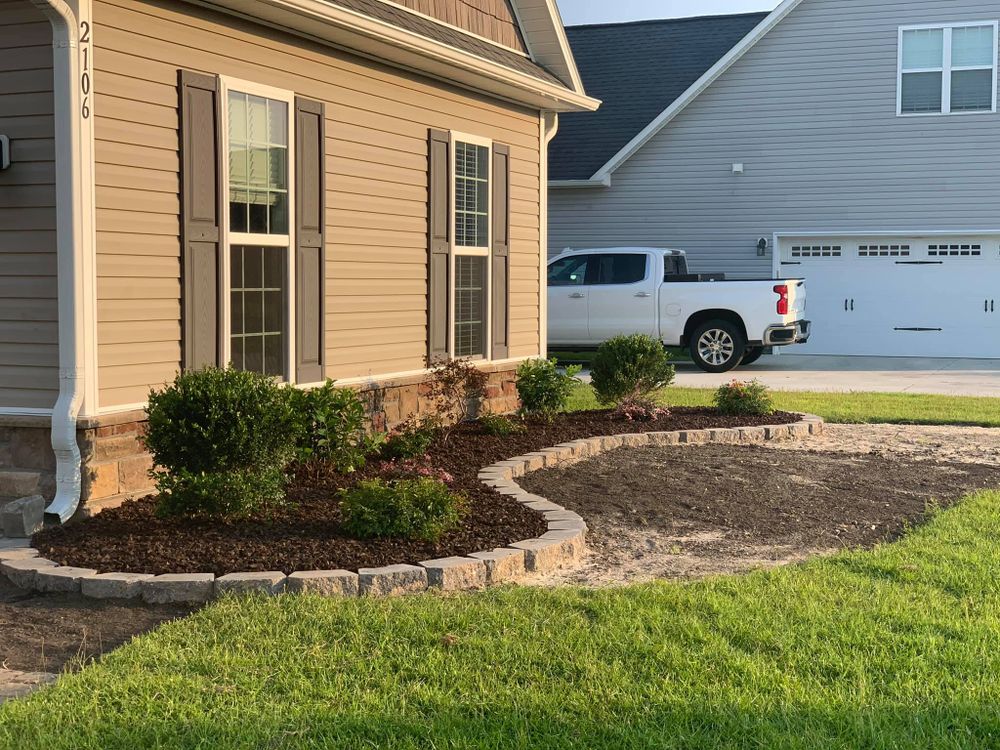 Mowing for All in One Landscaping in Jacksonville, NC