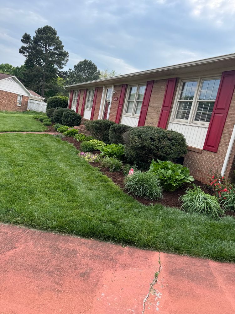 Enhance your outdoor space with our expert Landscape Design & Install service, providing personalized layouts and professional mulch installation to ensure a beautiful, sustainable landscape perfectly tailored to your home. for CW Lawn & Landscape in Hickory, NC