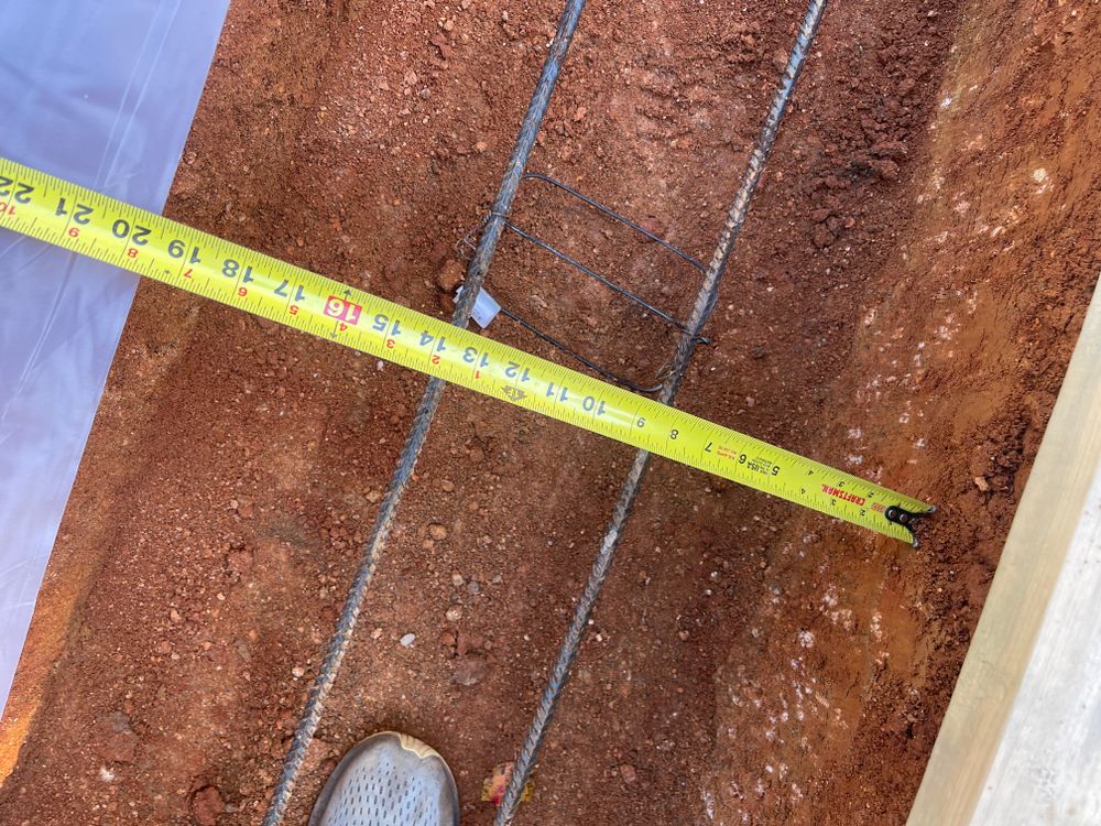 Our Footings service ensures the foundations of your home are strong and durable by providing expertly crafted concrete footings designed to support structural loads and maintain long-term stability. for Wenkel Concrete, LLC in Sherrills Ford, NC