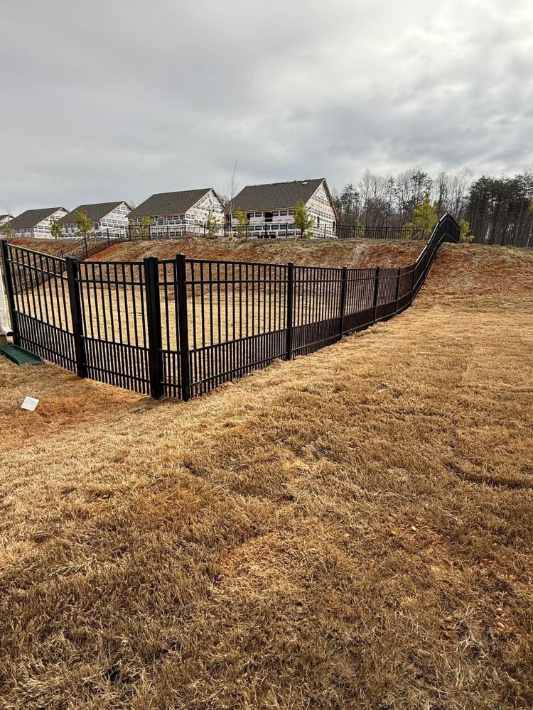 Our professional fence installation service enhances your home's security and aesthetic appeal, offering durable solutions tailored to your landscape that beautifully integrate privacy and style into your outdoor space. for Elevated Home Service Group in Mount Ulla, NC