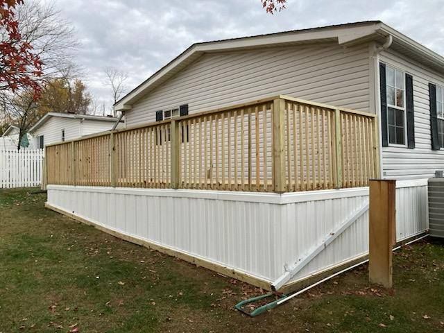 Enhance your outdoor spaces with our expert deck installation and maintenance services. Complement your new deck with our professional mulch installation, providing a polished look while promoting garden health and weed control. for Wolfe Custom Landscaping in Milford, OH