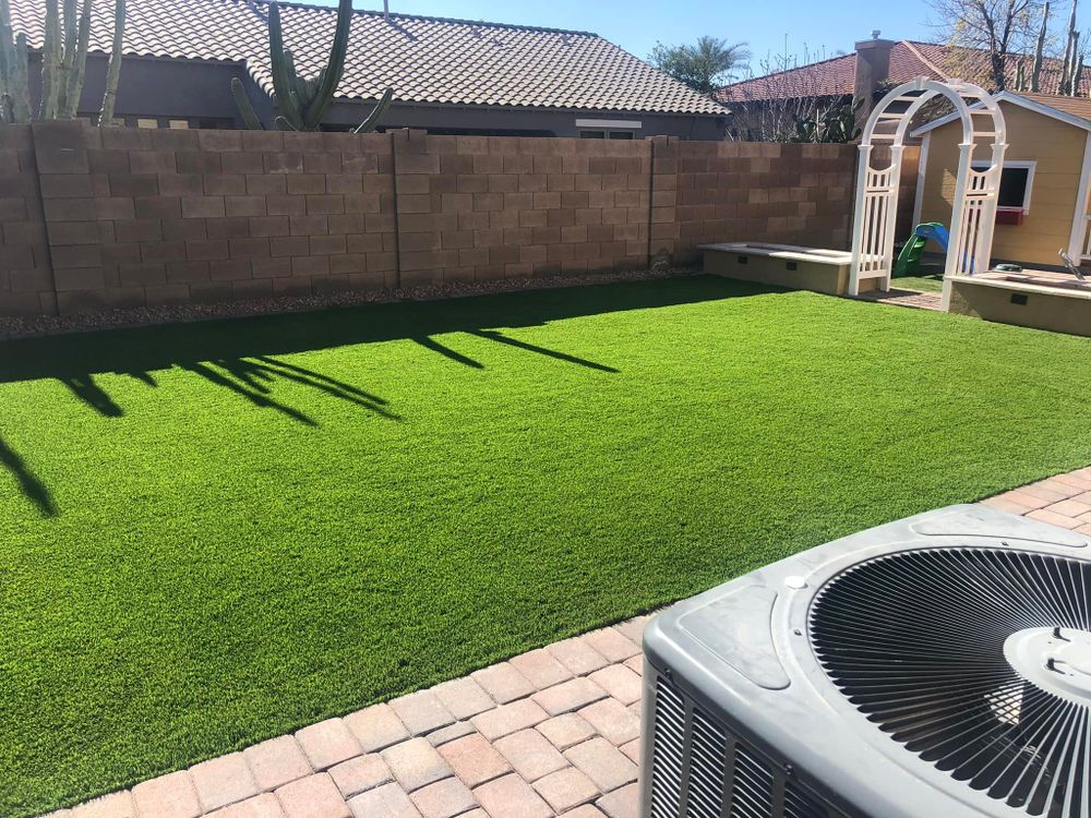 Our Artificial Turf Install service provides a low-maintenance alternative to traditional grass, offering a lush green lawn year-round without the need for mowing, watering, or fertilizing. Perfect for busy homeowners! for Desert Oasis Hardscape LLC  in Scottsdale, Arizona