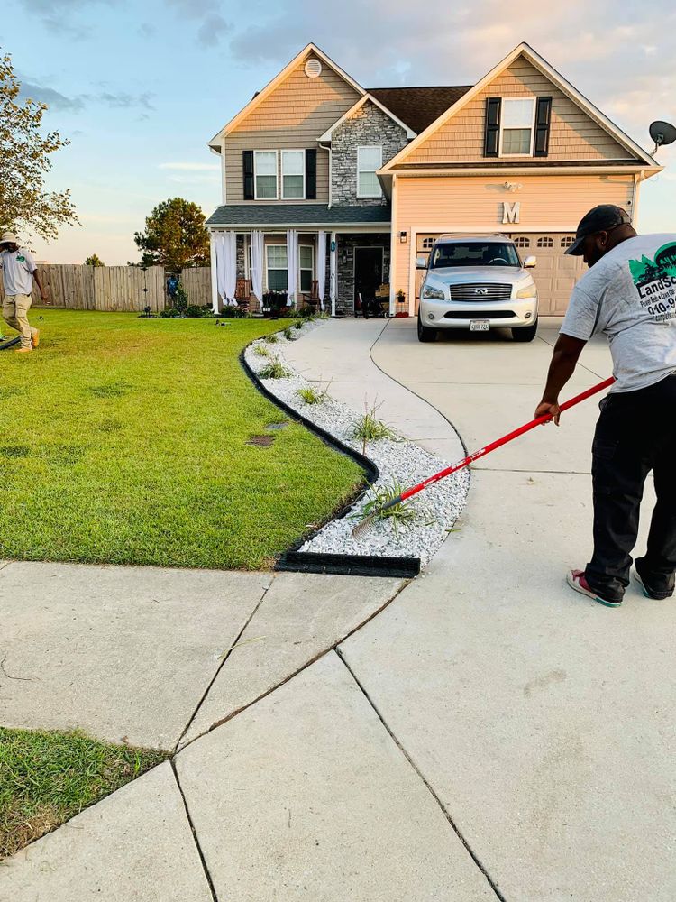 Mowing for All in One Landscaping in Jacksonville, NC