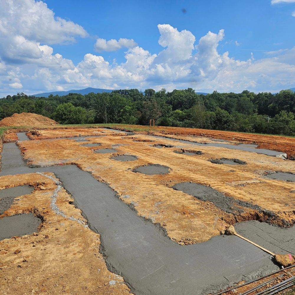 Our Foundation Digging service provides precise, reliable excavation work, ensuring stable and secure bases for your construction projects while prioritizing safety and efficiency to meet your specific home building needs. for Bledsoe & Sons Excavating and Developing in Dandridge, TN