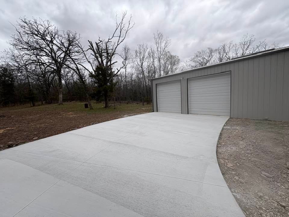 Our driveway construction service offers expert concrete slab construction, ensuring a durable and aesthetically pleasing driveway. Trust our skilled team for superior craftsmanship, reliability, and long-lasting results tailored to your home's needs. for Golden Eagle Concrete LLC in Tulsa, OK