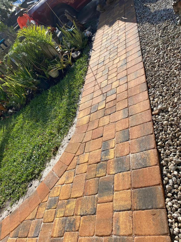 Enhance your home's curb appeal with our Paver Walkways service, offering durable and stylish paths that complement any landscape design. Trust us for professional installation and exceptional craftsmanship tailored to your space. for RPS Pavers and Concrete in Palm Bay, FL