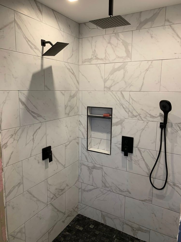 Transform your space with our expert bathroom renovation service. We specialize in creating modern, functional designs that enhance comfort and style while increasing the value of your home. for M3 Constructors in Florissant, MO