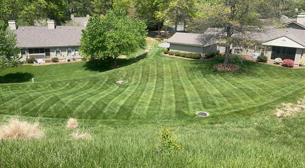 Enhance your outdoor space with our reliable Lawn Maintenance service, offering expert mowing, edging, and weed control. We ensure your lawn remains lush and immaculate throughout every season for optimal curb appeal. for Pisgah Property Services LLC in Asheville, NC