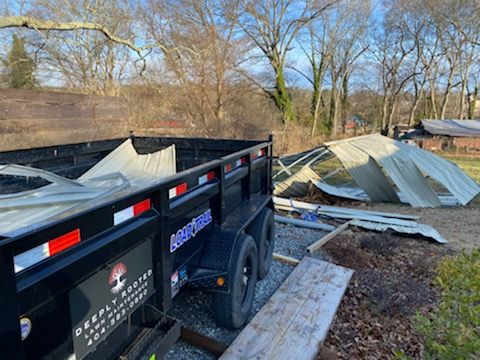 Our Junk Removal service helps homeowners quickly and safely dispose of unwanted items. We offer fast, friendly service with no job too big or small. for Deeply Rooted Lawn Installations - Sod Installation & Hydroseeding Services in Winder, GA
