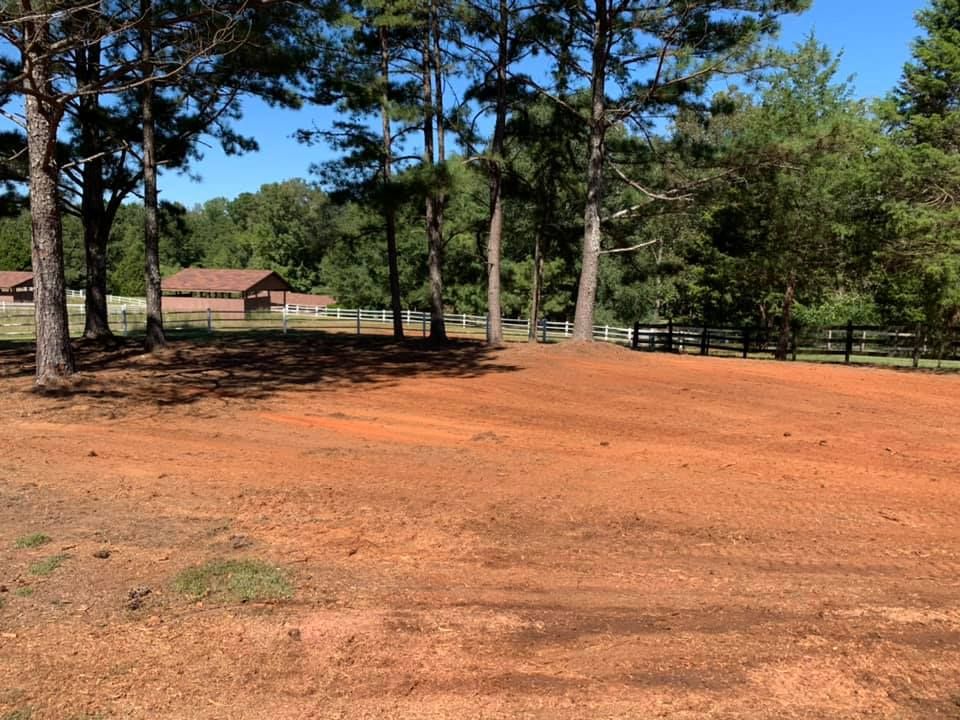 Discover what is land clearing with our professional grading service, ensuring your property is leveled and prepared for construction or landscaping, enhancing safety and aesthetics while preserving the environment. for KLNAX Enterprises Inc. in Social Circle, GA