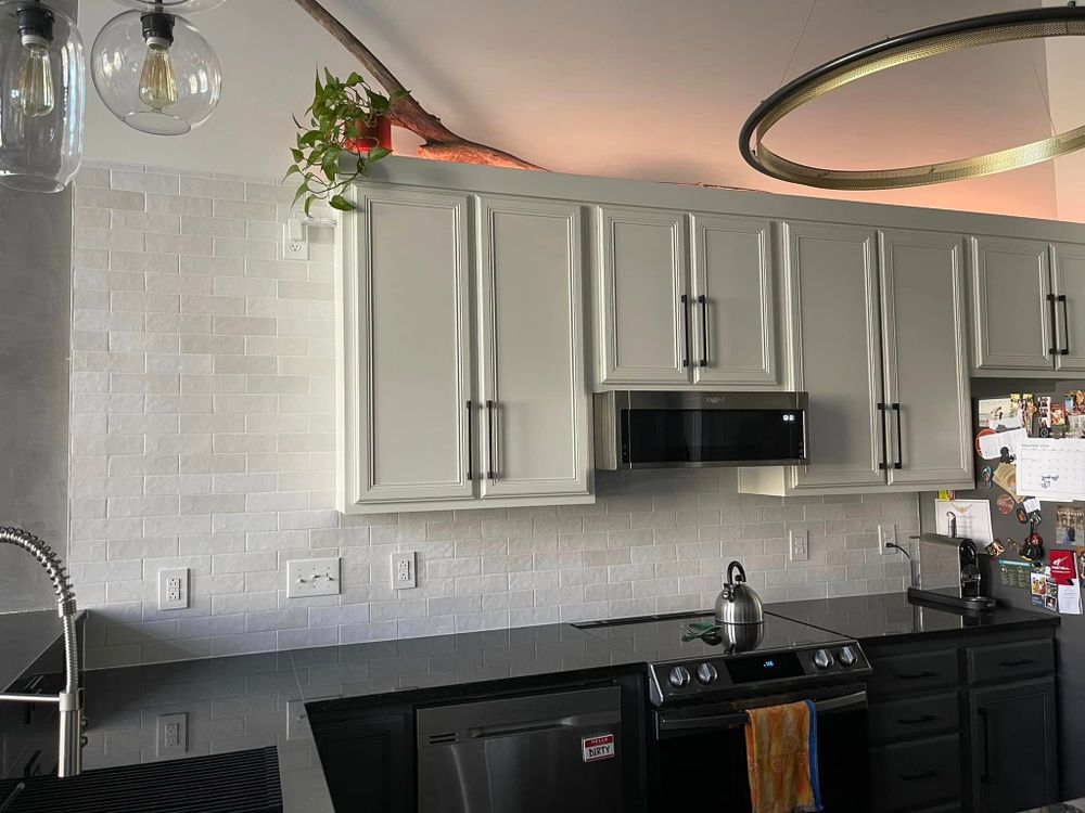 Our Kitchen Backsplash Installation service adds style, protects your walls, and boosts home value with precise tilework, expert craftsmanship, and durable materials tailored to complement your kitchen’s design perfectly. for Novo Tile Co. in Lillington, NC