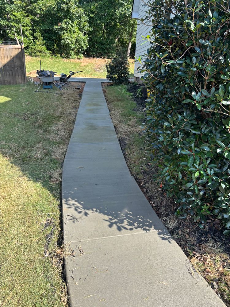 Enhance your home's curb appeal with our expert sidewalks service. Our durable, high-quality concrete sidewalks offer a seamless blend of functionality and style, transforming your outdoor space efficiently and beautifully. for JIF Concrete Services in Greenville, SC