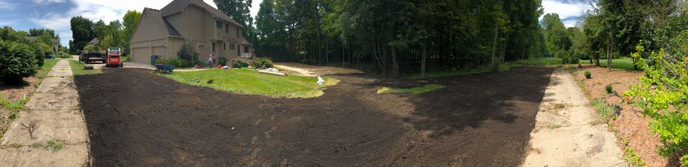 Enhance your property's foundation with our professional land grading service, ensuring proper drainage and a level surface for beautiful landscaping, preventing future water issues and promoting healthy plant growth. for Alltimate Outdoor Services in Warren, MI