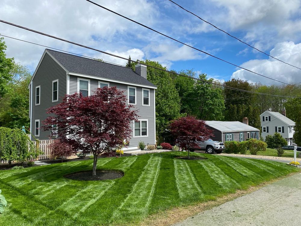 Our Lawn Care service ensures a lush, healthy lawn through expert mowing, fertilization, and weed control. Let us transform your outdoor space into a thriving oasis with professional care and attention. for Picano Landscaping in Reading, MA