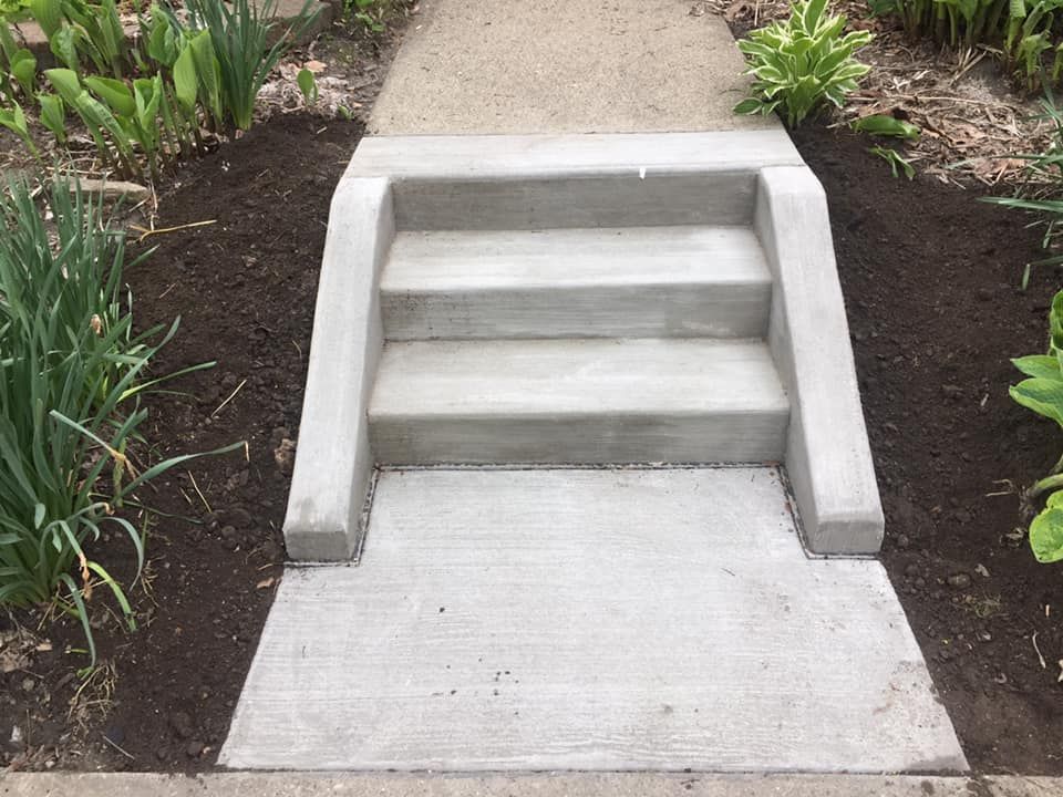 Our Stair Design & Installation service offers a variety of concrete stair options to enhance the aesthetic and functionality of your home. Let us create durable, stylish stairs for you! for Paul Turner Concrete & Excavating in Toledo, OH