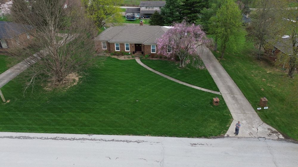 Our Weed Control & Fertilization service promotes a lush, healthy lawn by preventing weeds and nurturing grass with tailored treatments, ensuring your yard stays vibrant and well-maintained throughout the seasons. for JKL Lawn Service in Frankfort, KY