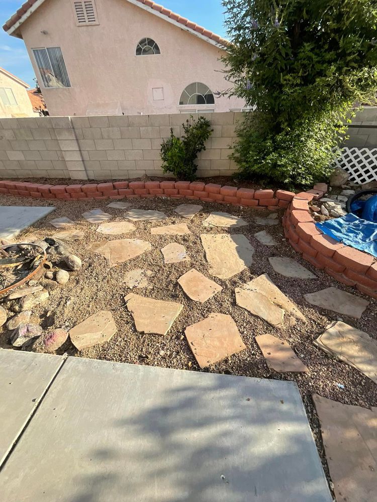 Our Retaining Walls service creates structurally sound walls that prevent soil erosion and support your landscape, providing both functionality and aesthetic appeal to your outdoor space. Trust us to enhance your property. for Top It Off Landscaping LLC in Henderson, NV