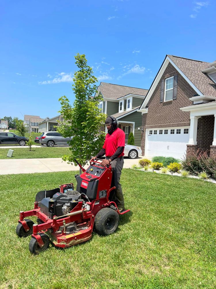 Our professional mowing service offers homeowners a hassle-free solution for maintaining their lawn, ensuring it stays neatly trimmed and looking its best all season long with our skilled landscaping team. for Team Bard Lawn Care SVC in Woodbury, TN