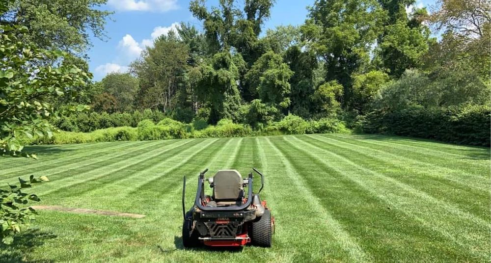 Our Full Lawn Maintenance includes expert mowing services to keep your yard looking pristine. Let us handle all aspects of lawn care for a beautiful, hassle-free outdoor space. for A&A MultiScapes and Tree Service in Dallas,  GA