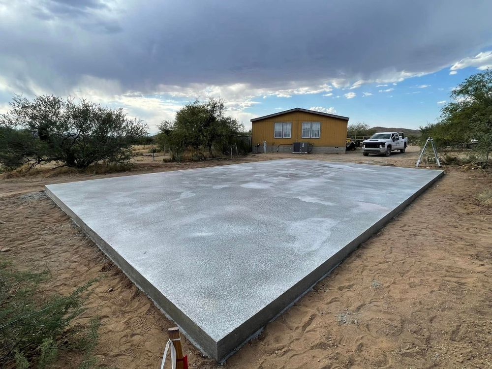 Our House Pad Grading service ensures a stable, level foundation for your home construction. We expertly prepare the land, optimizing drainage and soil compaction to prevent future settling issues. for Roughout Excavation in Vail, AZ