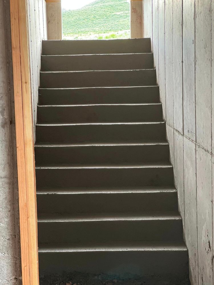 Our Stair Design & Installation service offers custom concrete stair solutions to enhance the functionality and aesthetics of your home. Let us help you create a beautiful and durable staircase today. for Hard Knox Concrete  in Montpelier, ID