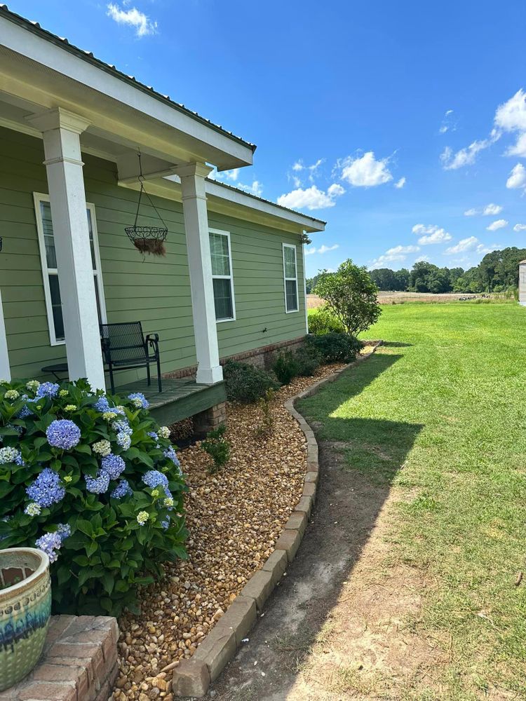 Our expert team specializes in designing and building durable retaining walls to prevent soil erosion, create leveled outdoor spaces, and enhance the overall beauty of your property. for Deep South Lawn Care in Moultrie, GA