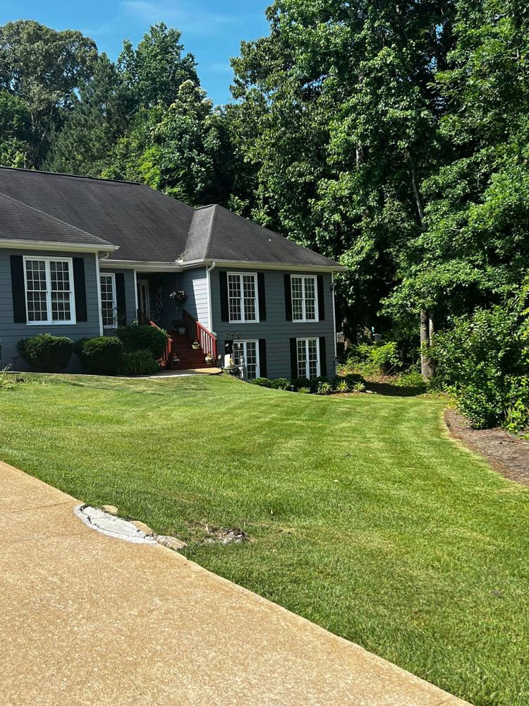 Our professional mowing service will ensure your lawn is maintained regularly, leaving you with a well-manicured and pristine outdoor space. for Reg's Lawn Care Services in LaGrange, GA