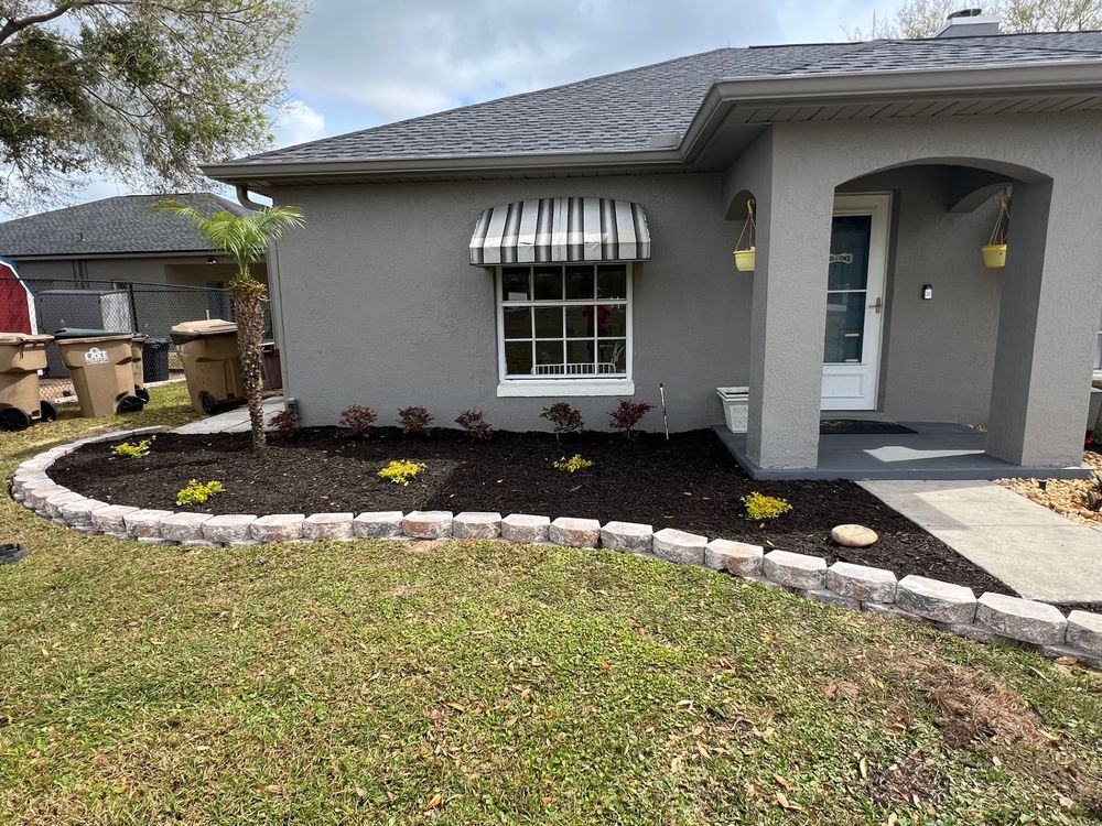 Landscape with retaining wall for Thurmond & Sons Landscaping  in Montverde, FL