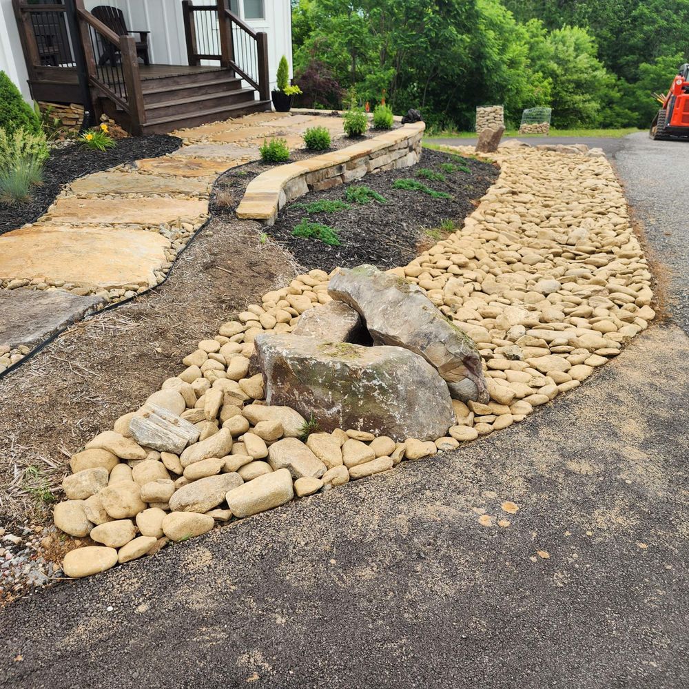 Transform your outdoor space with our Patio Design & Construction service, offering customized layouts, high-quality materials, and expert craftsmanship to create the perfect retreat for relaxation and entertainment in your backyard. for C & D Landscaping Services in Blairsville, GA