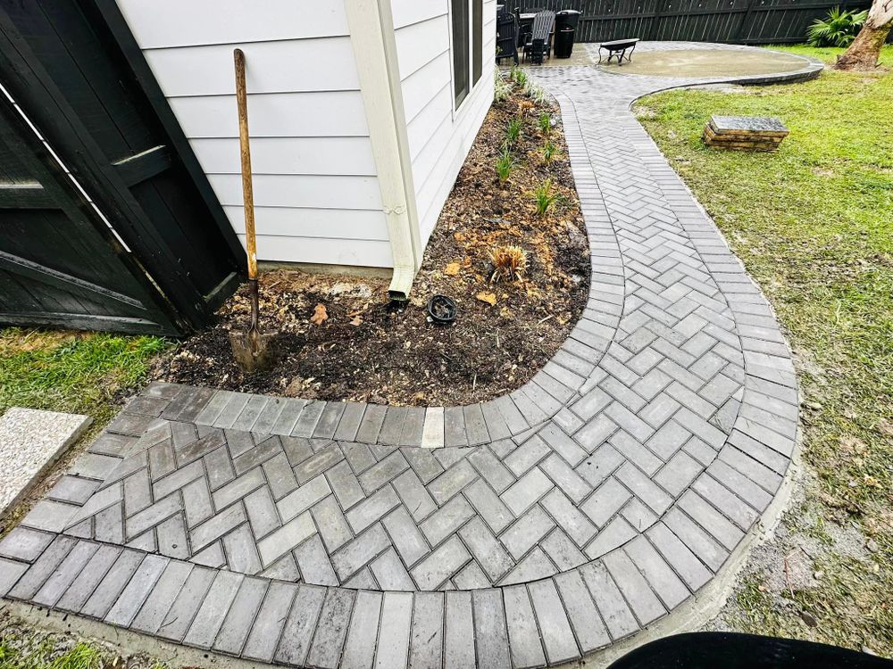 Our Walkways service creates beautiful and functional pathways through your outdoor space, enhancing the overall aesthetic and usability of your landscaping. Trust us to bring your vision to life. for George’s Hardscape  in Bluffton, SC