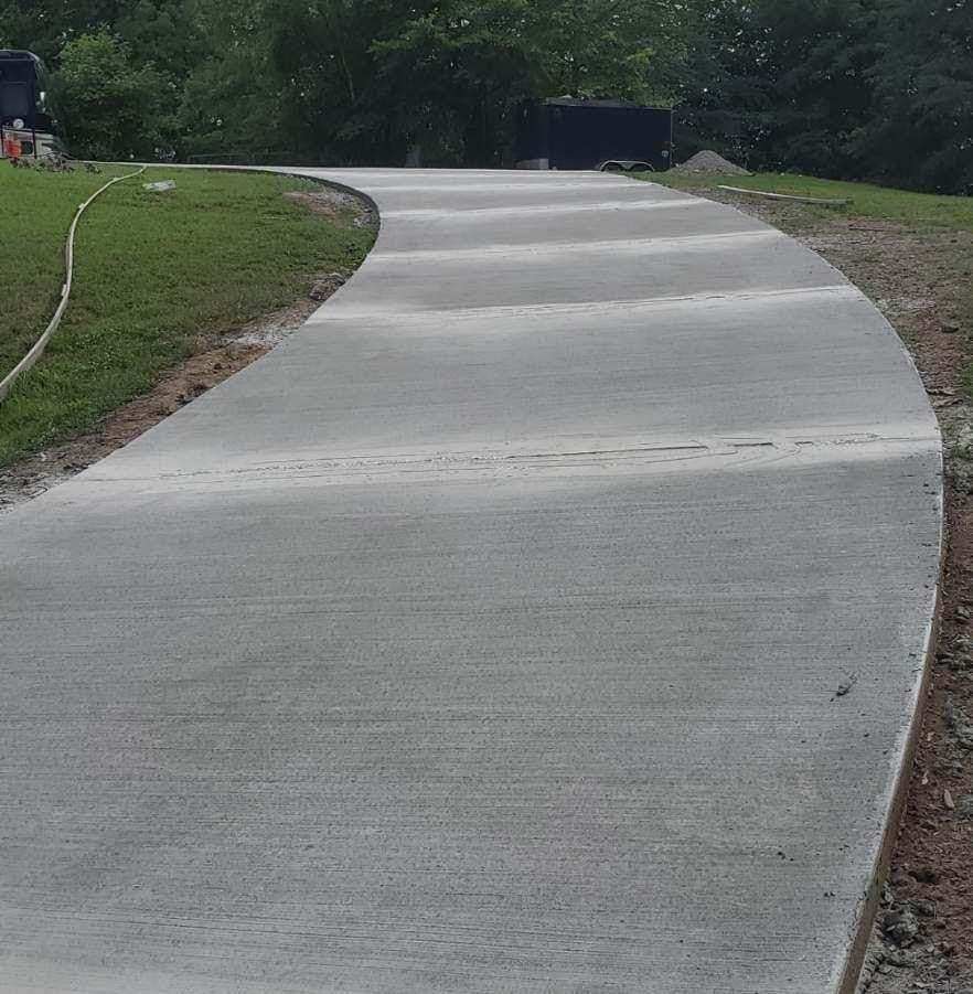 Enhance your home's curb appeal and functionality with our professional Sidewalk Installation service. Our experienced team will expertly install durable and visually appealing sidewalks to improve your property. for Sullivan Concrete in Kingston Springs, TN