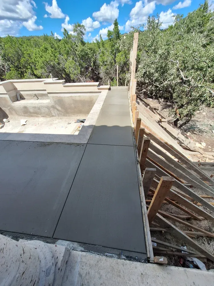Transform your outdoor space with our patio design and installation service, combining expert planning, quality materials, and efficient concrete pumping to create a durable, attractive patio tailored to your home. for Leo's Concrete Crew in Elgin, TX