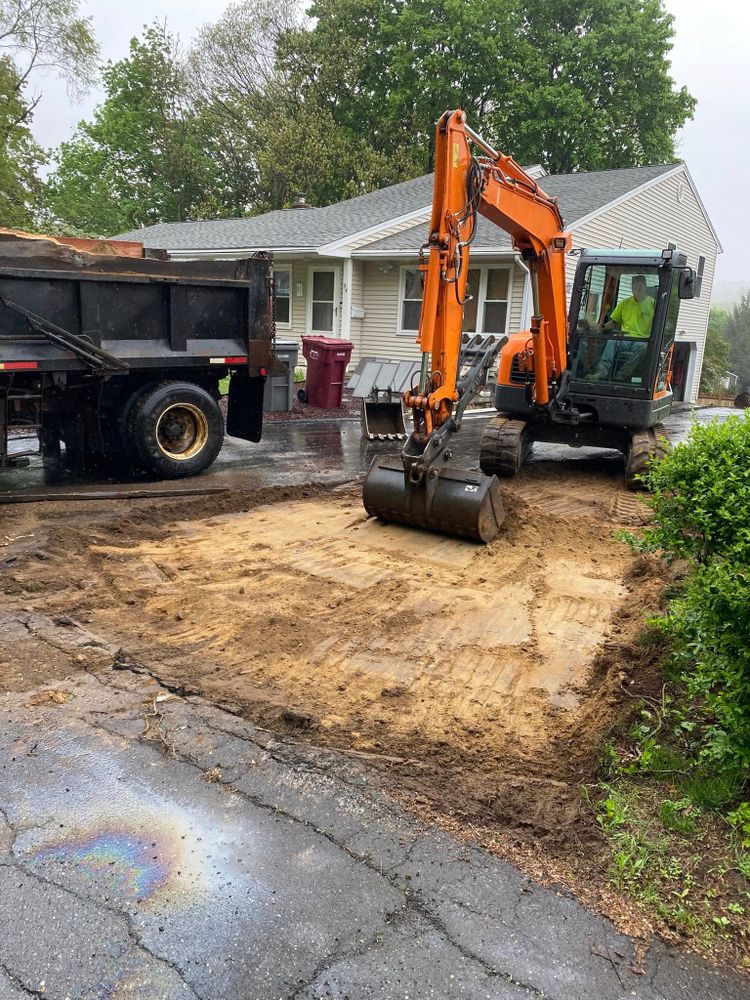 Enhance your property's drainage and aesthetics with our expert land grading services. We ensure a level, stable foundation, preventing water issues while preparing your site for construction or landscaping projects. for Davis Services LLC in Bethany, CT