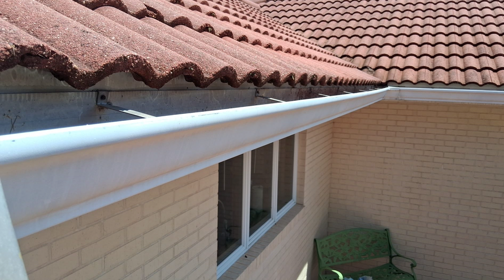 Our gutter cleaning service ensures your home's gutters are free from debris, preventing water damage and enhancing drainage efficiency. Trust our expert team to maintain the integrity of your roofing system. for Haskett Pro-Wash LLC in Newton, IL